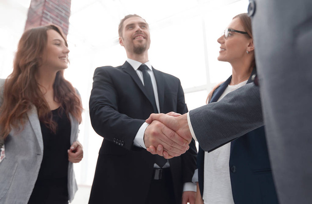 businessmen shaking hands in conference room - Фото, изображение