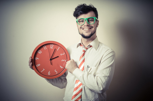 funny businessman with wall clock - Foto, Bild