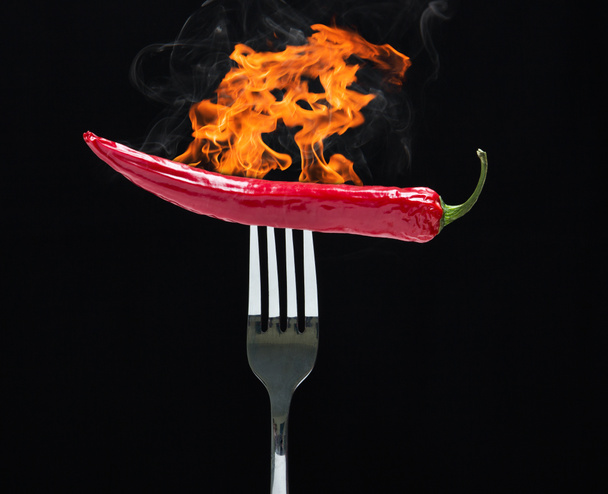 Caliente frío en tenedor con fuego
 - Foto, Imagen