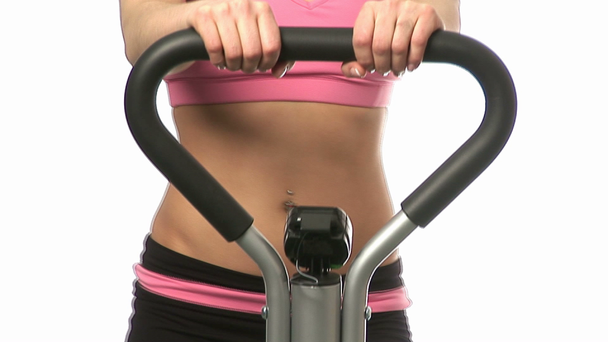 Woman Exercising on a Stepper - Imágenes, Vídeo