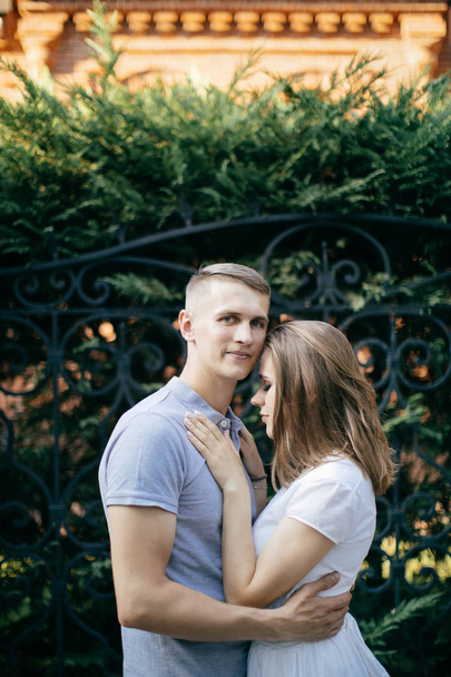 young couple in love posing on outdoor photo - session  - Photo, image