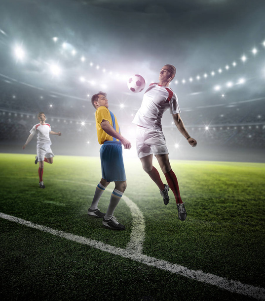 Soccer players in stadium. The imaginary stadium is modelled and rendered. - Φωτογραφία, εικόνα
