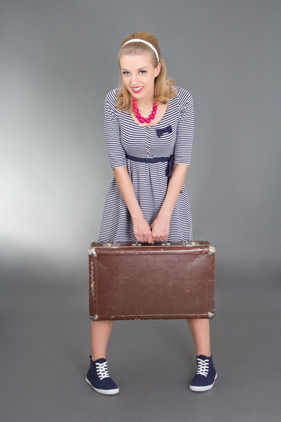 pinup girl with brown retro suitcase - Fotoğraf, Görsel