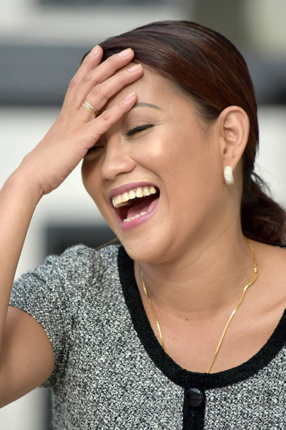 Beautiful Filipina Woman Laughing - Фото, изображение