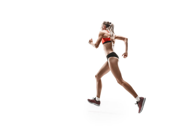 one caucasian woman running on white background - Foto, Bild
