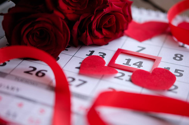Valentine's day calendar with the date 14, hearts and roses - Photo, Image