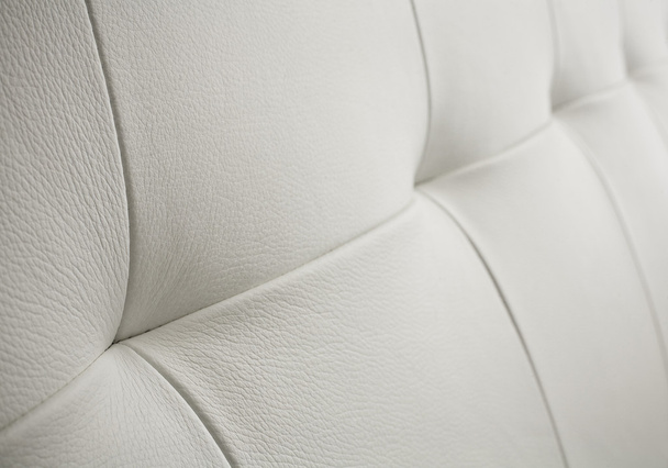 White bright leather background or texture with sewing. - 写真・画像