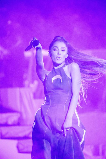 American singer and actress Ariana Grande performs at a concert in Guangzhou city, south China's Guangdong province, 30 August 2017. - Fotoğraf, Görsel