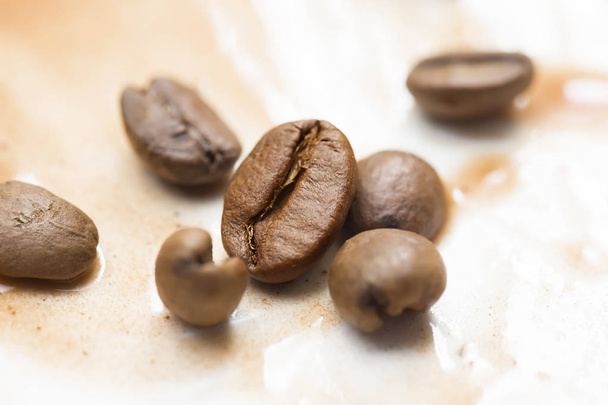 Coffee beans closeup. Sprinkled coffee - Photo, Image
