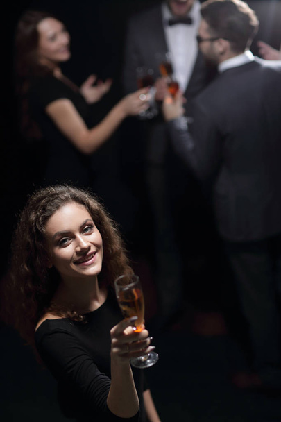 stylish young woman with glass of champagne - Zdjęcie, obraz