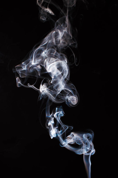 Smoke fragments on a black background - Фото, зображення