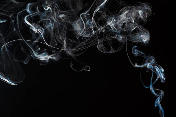 Smoke fragments on a black background - Foto, afbeelding