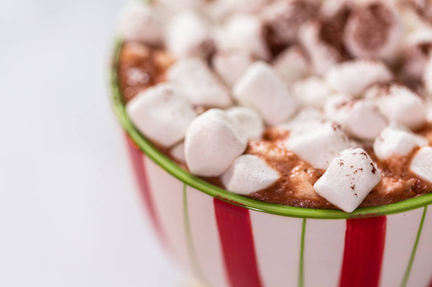 American hot chocolate with marshmallow toppings in large Christmas mug. - Photo, image