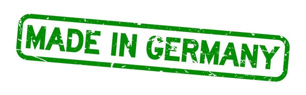 Gyártott-ban Németország szó tér gumi pecsét pecsét fehér alapon zöld grunge - Vektor, kép
