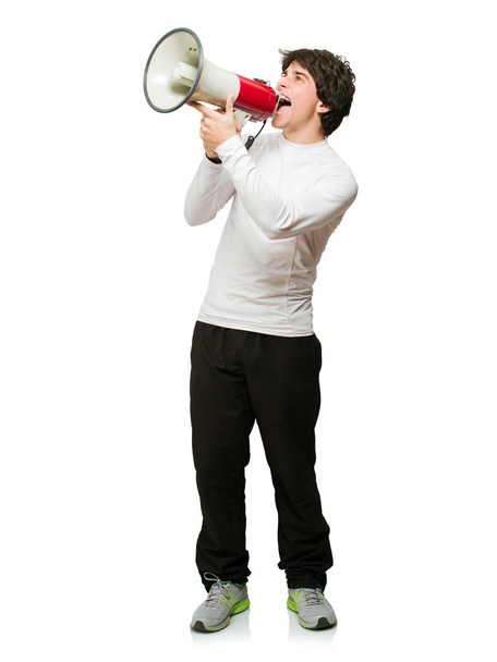 mladý muž křičí přes megafon - Fotografie, Obrázek