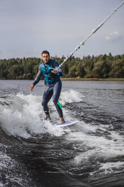 man on wakesurfing. wave from the boat. - Fotoğraf, Görsel