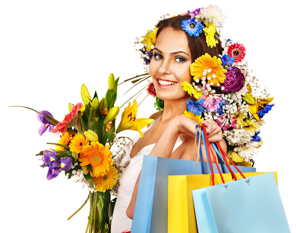 Femme avec sac à provisions tenant fleur
. - Photo, image
