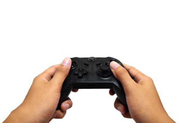 male hand holding a joy controller on a isolated background - Photo, Image