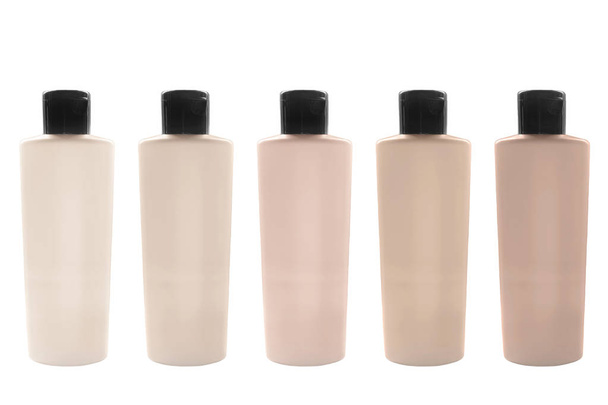 Palette of liquid mat concealer bottles isolated over white - Photo, Image