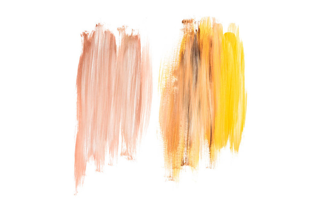 Manchas de acuarela abstractas de color beige y amarillo aisladas en blanco
 - Foto, Imagen