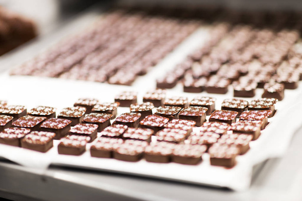 chocolate candies at confectionery shop - Photo, Image