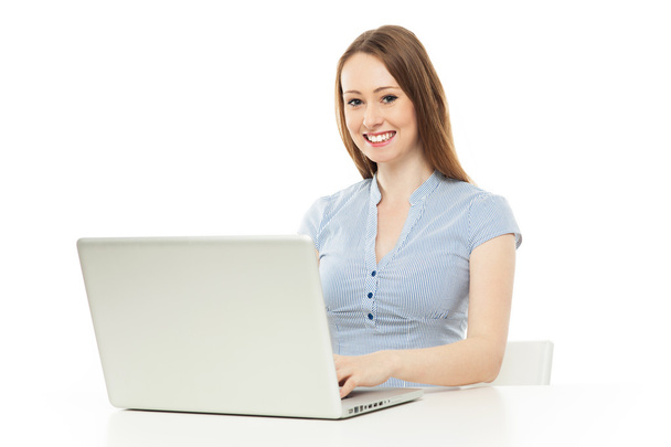 Woman sitting with a laptop - Photo, Image