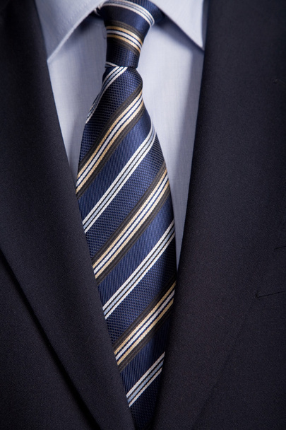Yksityiskohta liikemies puku sininen solmio
 - Valokuva, kuva