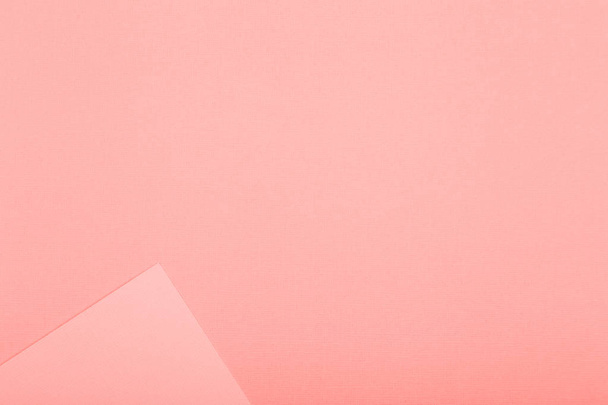 Geometric paper background. Living coral color mockup for flat layout compositions - Photo, Image