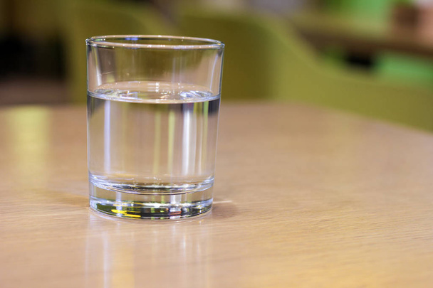 Glass of clear water on wooden table.Healthy food - healthy lifestyle - 写真・画像