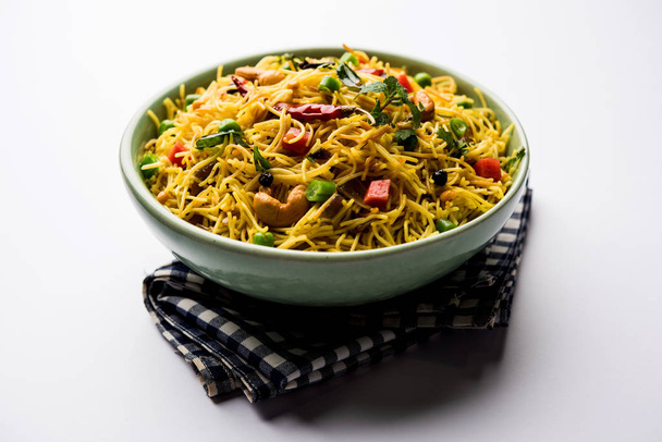 Semiya Upma or Vermicelli Uppuma or uppittu is a popular breakfast menu from south India. served in a bowl. selective focus - Photo, Image