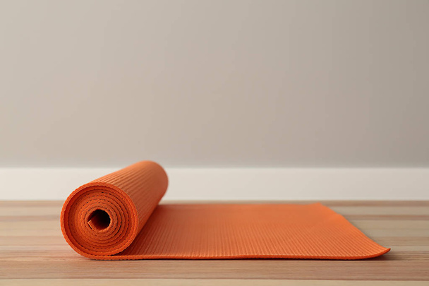 Yoga mat on floor in gym - Photo, Image
