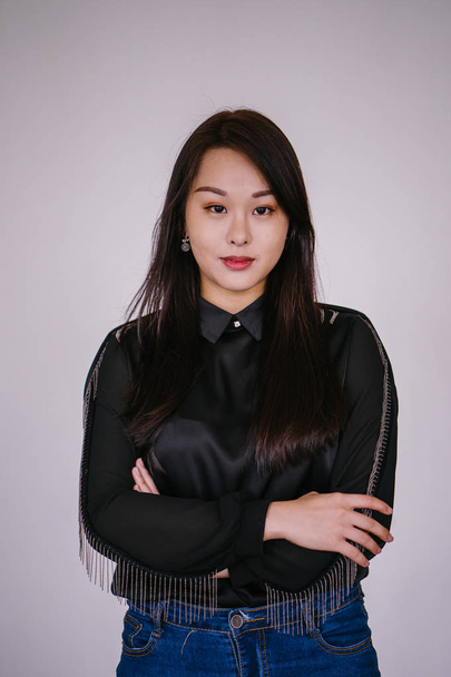 Portrait of a young Chinese Asian woman posing - Fotó, kép