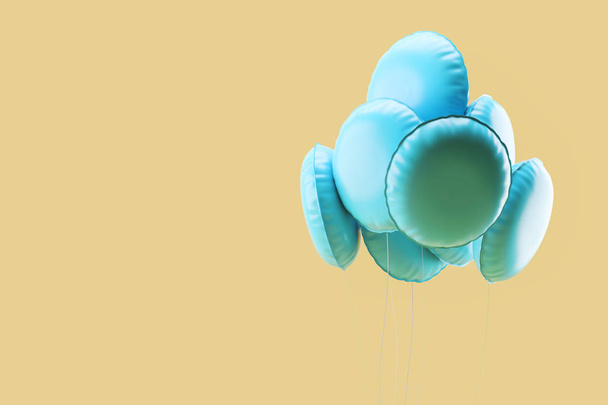 Ein Bündel blauer Luftballons schwebt über gelbem Hintergrund. Konzept des Feierns und Glücks. 3D-Rendering-Attrappe - Foto, Bild