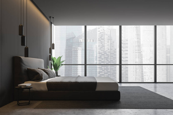 Side view of panoramic bedroom with gray walls, concrete floor, gray master bed standing on carpet and big potted plant. 3d rendering - Fotografie, Obrázek