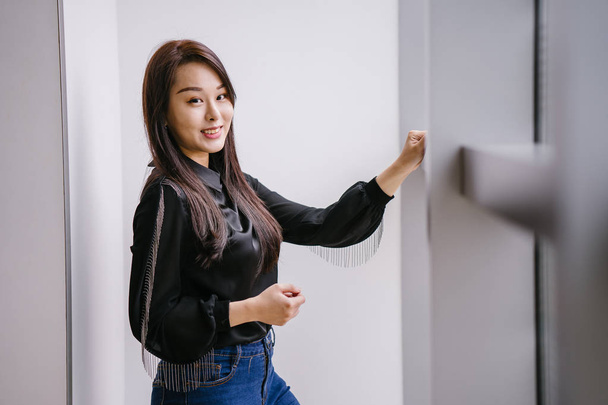 Portrait of a young Chinese Asian woman posing - Fotó, kép