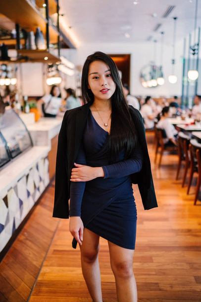 portrait of a confident, young, beautiful and confident Asian woman - Foto, imagen