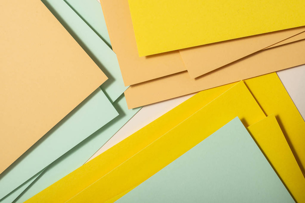Colorful polygon paper design. Pastel tones geometric shapes background. Abstract composition wallpaper. - Foto, Imagem