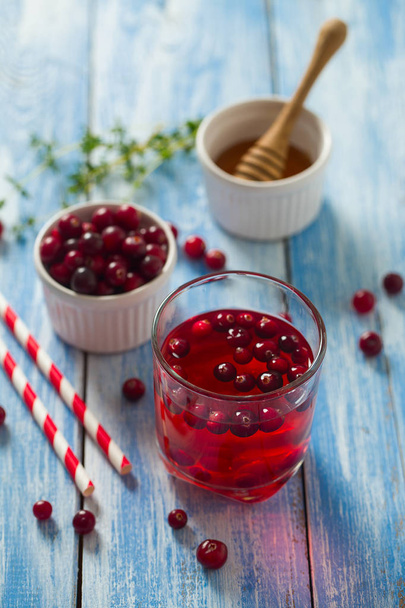 cranberry drink on wooden surface - Photo, image