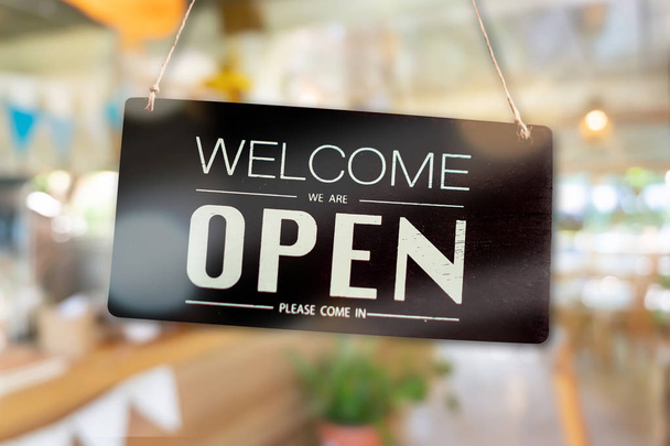 Welcome open sign use for any business in front of shop or online background. - Photo, Image