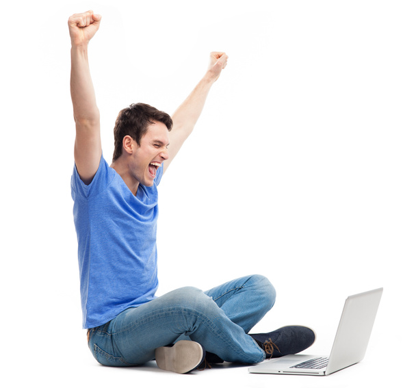 Jeune homme excité utilisant un ordinateur portable
 - Photo, image