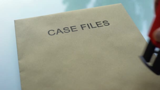 Υπόθεση αρχεία αποχαρακτηριστεί, πλευρά σφράγιση σφραγίδα σε φάκελο με σημαντικά έγγραφα - Πλάνα, βίντεο
