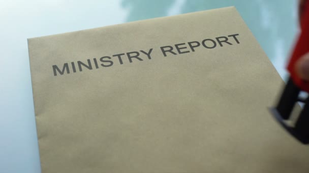 Ministry report classified, stamping seal on folder with important documents - Filmmaterial, Video