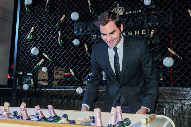 Swiss tennis player Roger Federer poses at the Moet and Chandon Party during the Shanghai Rolex Masters tennis tournament in Shanghai, China, 7 October 2017. - Fotografie, Obrázek
