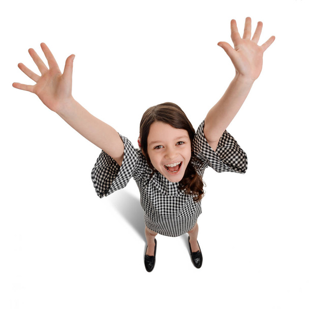 Overjoyed girl waving hands - Photo, image