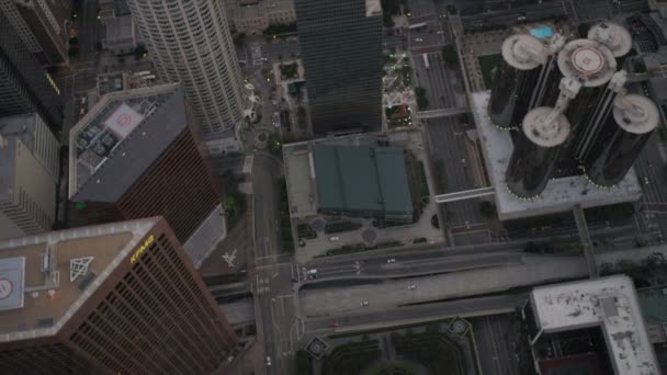 Aerial vertical view of skyscrapers in downtown Los Angeles, USA - Felvétel, videó