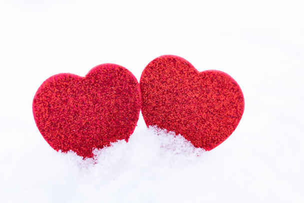 Valentine's Day. Hearts in the snow - 写真・画像