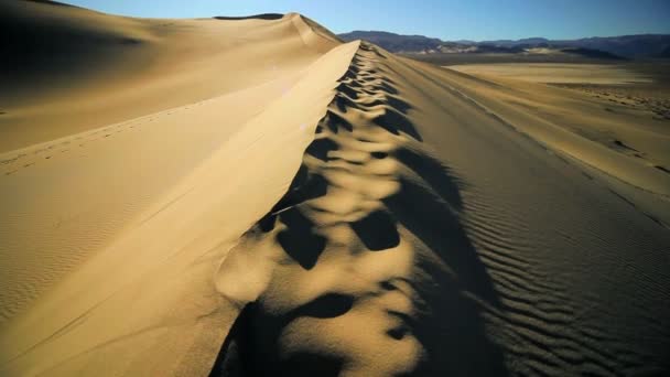 Dunas de arena que cambian el sol
 - Metraje, vídeo