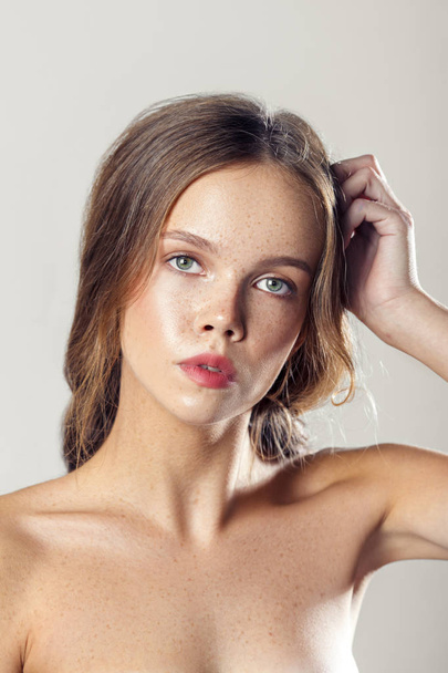Young beautiful woman with clean perfect skin close-up. Beauty portrait - Fotografie, Obrázek