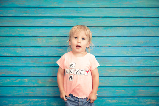 Portrait of funny child in Love Mom t-shirt, Mothers day concept - Valokuva, kuva