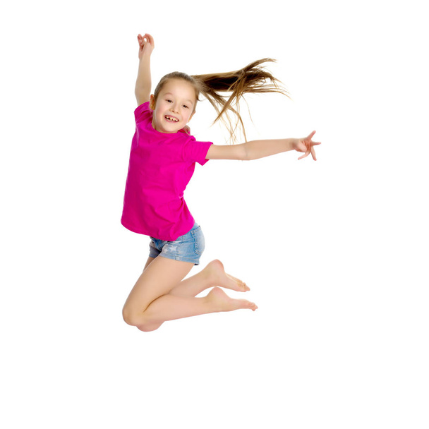 Girl gymnast jumping. - Foto, imagen